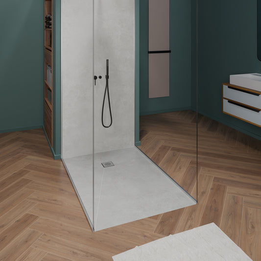 Waterproof extruded polystyrene shower tray with stainless steel grate