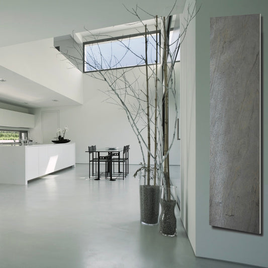 Wall-mounted towel warmer in natural slate, programmable with remote control