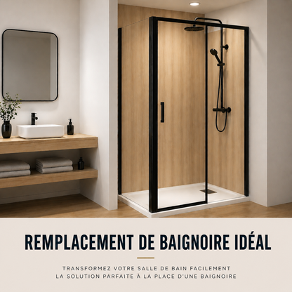 Visualisation d’une cabine de douche coulissante noire à deux vantaux installée à l’emplacement précédemment occupé par une baignoire.